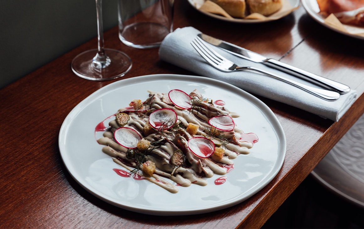 a plate of roast duck slices